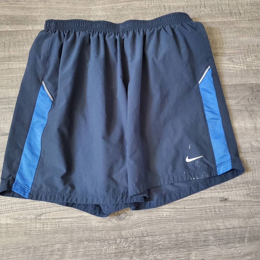 Nike dry fit 5" running shorts, navy blue, medium.